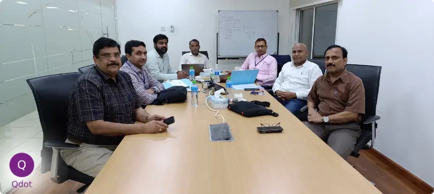 Consultants providing ISO 9001 certification guidance to a Dubai-based company during QMS implementation.
