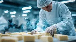 Businessman with holographic icons explaining ISO 9001 certification process in UAE